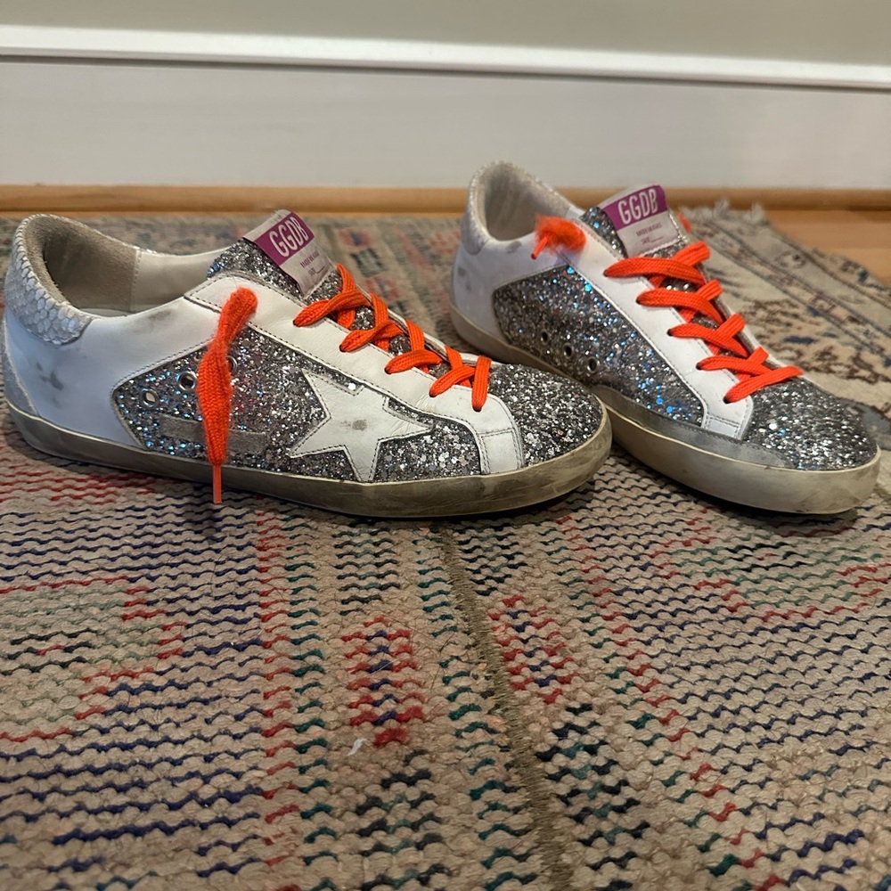 Golden Goose Superstar Sneakers with Silver Glitter and Orange Accents